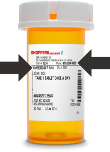 pill bottle with arrows pointing at the prescription number and phone number